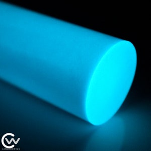 May include: A bright blue glow-in-the-dark cylindrical rod. The rod is smooth and has a rounded end.