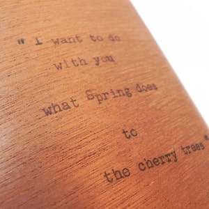 Pablo Neruda Vintage Typewriter Poetry Mahogany Wood Flask Quote I Want to do with you what the Spring does to the cherry trees 6oz flask image 1