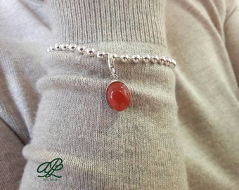 Sterling silver bracelet with cabochon pendant conelian
