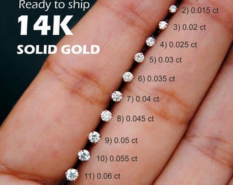 May include: A selection of 14K solid gold stud earrings, each with a different carat weight, ranging from 0.01 ct to 0.06 ct. The text "Ready to ship" and "SOLID GOLD" are also visible.