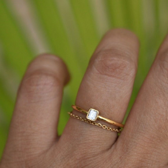 Dainty emerald cut ring deals