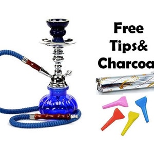 May include: Blue glass water pipe with a silver base and a blue hose. The pipe comes with a pack of charcoal and four colorful silicone mouthpiece tips. Free Tips & Charcoal.