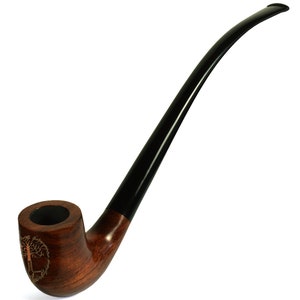 May include: A brown wooden smoking pipe with a black stem and a tree of life design on the bowl.