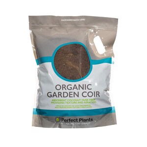 May include: A white bag with a blue and white logo that says "Organic Garden Coir". The bag contains brown coconut husk fiber. The bag also says "Absorbent Coconut Husk Fiber Providing Texture and Aeration" and "Perfect Plants" with a logo of a green plant. The bag says "Net Volume 8 Dry Quarts".