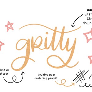 May include: A gold glitter pen with the word "gritty" written in cursive. The pen has a textured surface and doubles as a sketching pencil. The image also includes a description of the pen's stroke, which is narrow on the upstroke and strong on the downstroke.