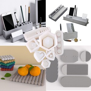 May include: A set of silicone molds for making concrete home decor. The molds are in various shapes, including a hexagon, heart, and a set of three circles. The molds are white and are shown on a white background.