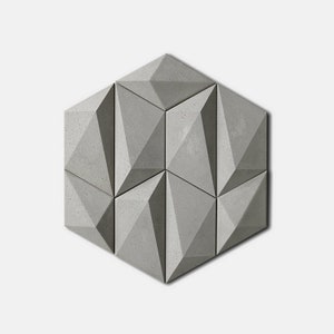 May include: A hexagonal tile made of concrete with a geometric pattern of triangles. The tile is a light grey colour and has a rough texture.