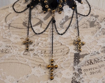 Black and gold crosses chocker