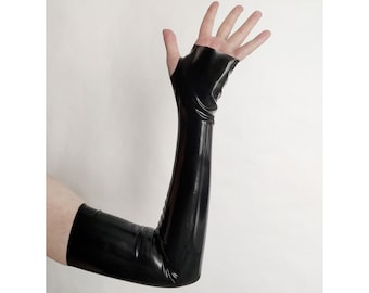 May include: Black latex arm-length glove with an open palm design. The glove extends from the wrist to the upper arm, showcasing a sleek, shiny finish. The brand name "Charm Latex" is visible in the lower right corner.