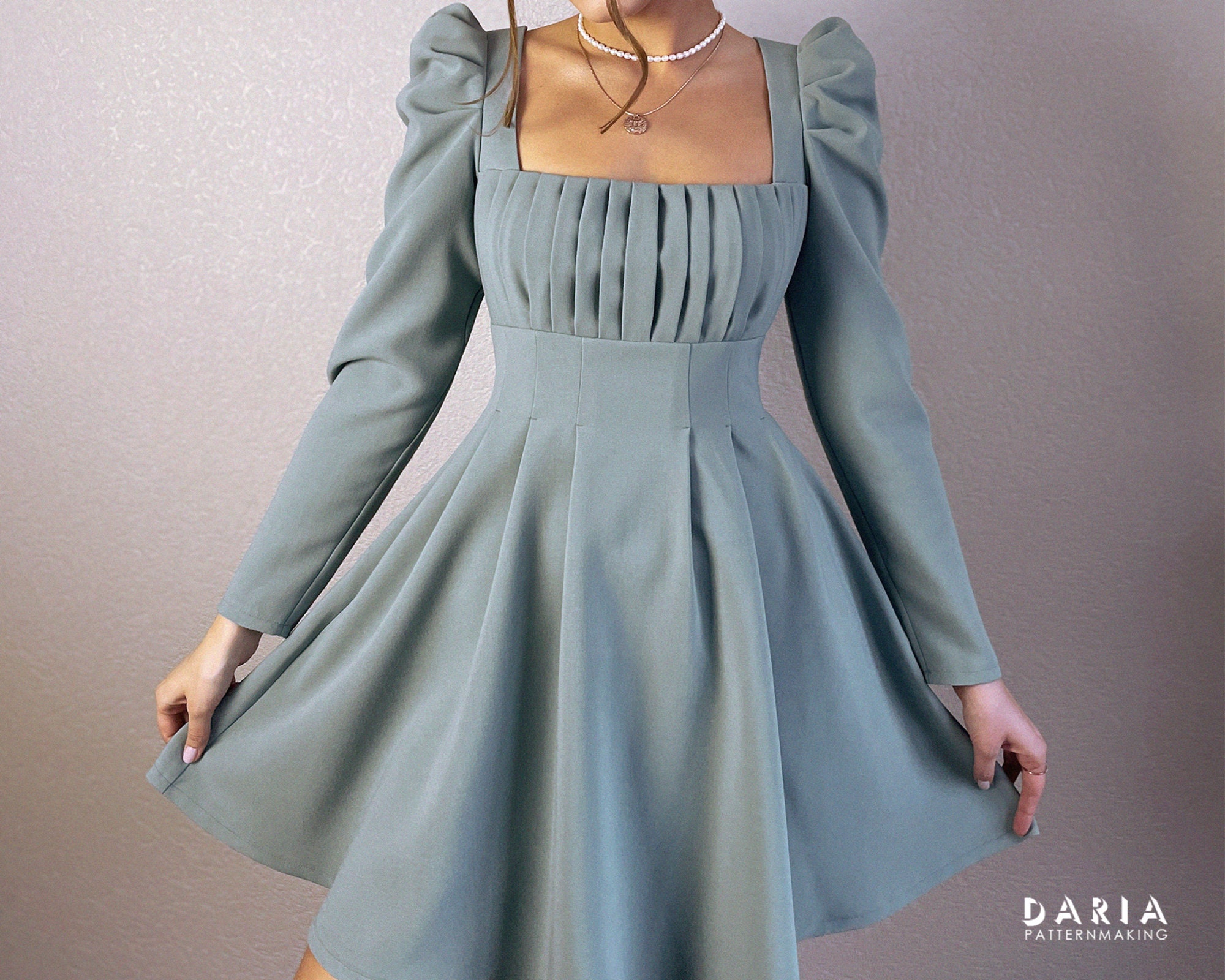 Pleated Dress With a Bow Back Detail and Puff Sleeves EU 32-54 US