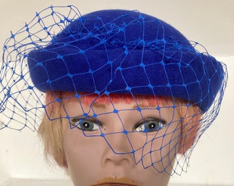 Vintage 1980's electric blue Birdcage Veil Pillbox Hat  with bow decoration made in England