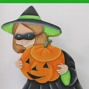 Witch with pumpkin