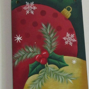 Recycled fan blade painted with Christmas ornaments and snowflakes. Great for your holiday decor or for gift giving.