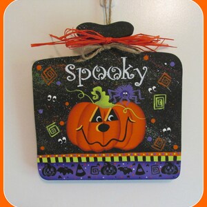 SPOOKY pumpkin sign board with raffia bow. image 1