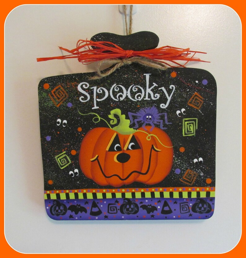 SPOOKY pumpkin sign board with raffia bow. image 1