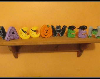 HALLOWEEN shelf sitter letters.