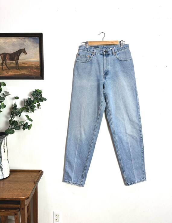 90s Levi’s 560 Jeans • 31 Waist | Made in USA | Loose Tapered Straight Fit Light Wash Vintage Denim