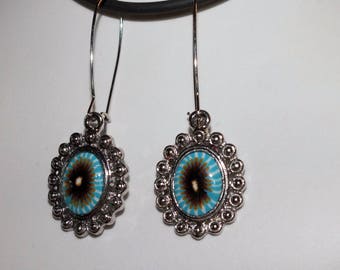 Boucles d'oreilles fleurs bleues imaginaires cerclées