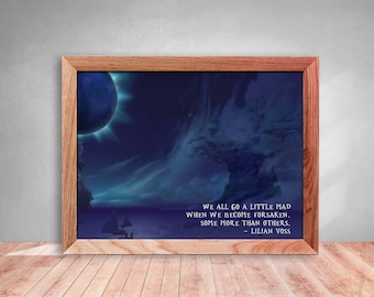 May include: A framed print with a dark blue and purple background featuring a large, dark blue moon with a ring of light around it. The print also features a large, snow-covered tree in the foreground. The quote "We all go a little mad when we become forsaken. Some more than others. - Lillian Voss" is printed in white text at the bottom of the print.