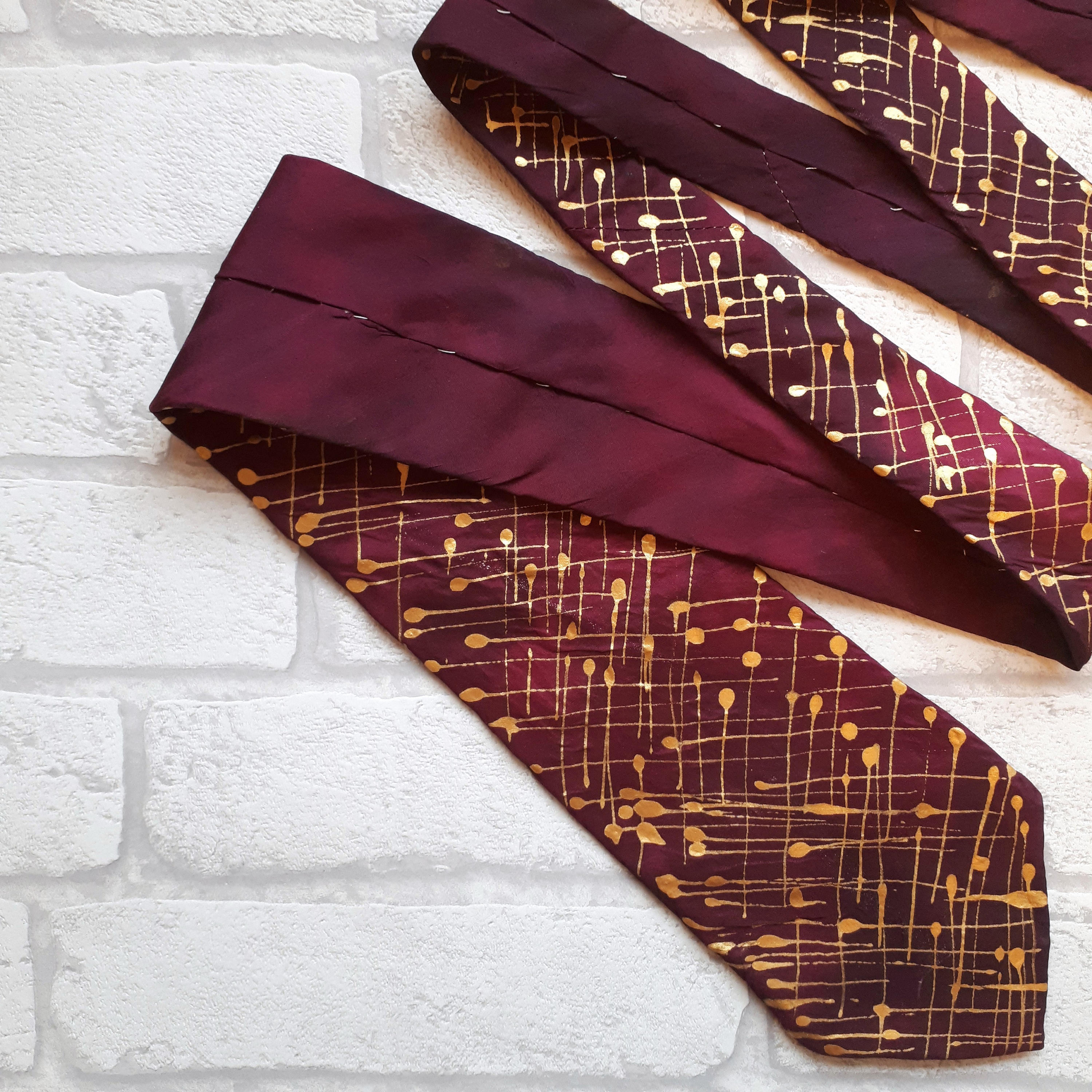 burgundy and gold tie