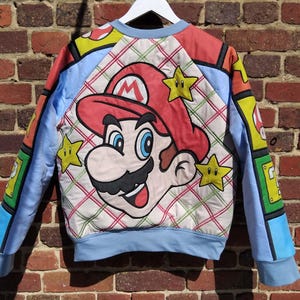 Bomber jacket upcyclé patchwork vintage gaming - veste oversize M/L pièce unique brodée main couette recyclée slow fashion - Mario Bros