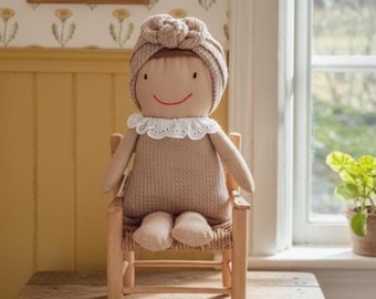 Handmade fabric doll with turban and dress, neutral color palette