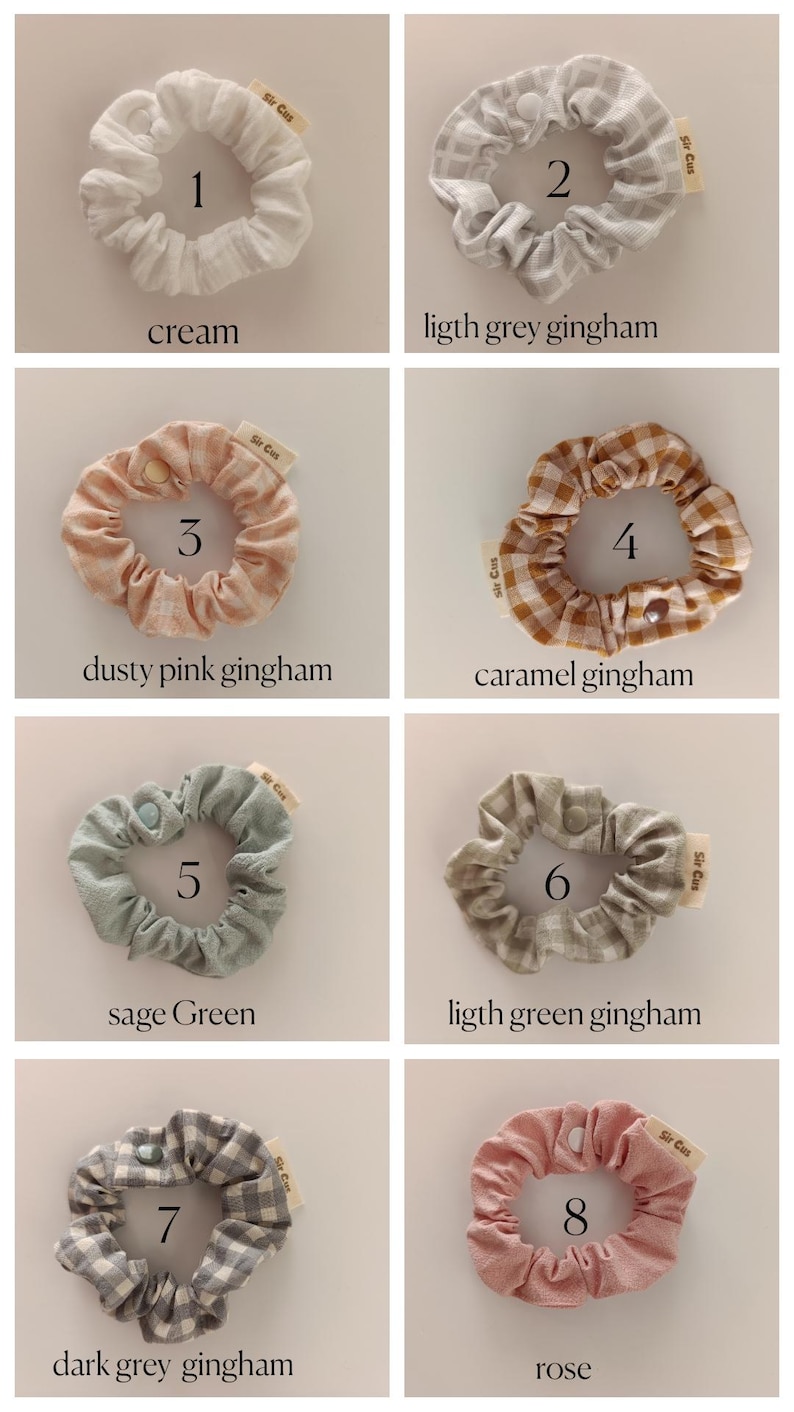 May include: Eight scrunchies in various colors and patterns are displayed. Colors include cream, light grey gingham, dusty pink gingham, caramel gingham, sage green, light green gingham, dark grey gingham, and rose. Each scrunchie has a small tag that says "Sir Cus".