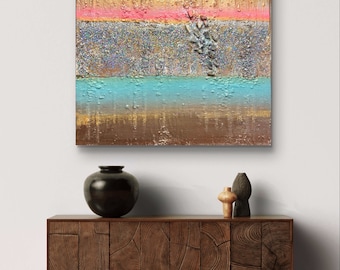 May include: Abstract painting with gold, pink, blue, and brown stripes. The painting has a textured surface and a glittery effect.