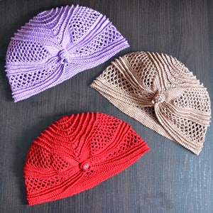 three crochet lacy hat wor woman with butterfly accent pattern