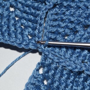 Close-up photo of joining front post double crochet pattern of the hat.