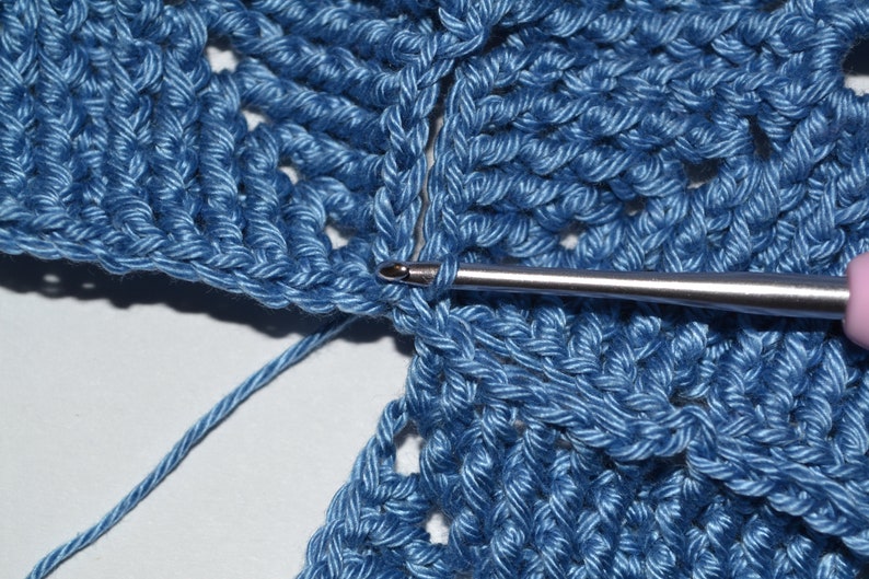 Close-up photo of joining front post double crochet pattern of the hat.