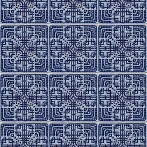 May include: A grid of twelve square crochet motifs arranged in four rows and three columns. Each motif features a geometric pattern in dark navy blue and light blue yarn. The top left corner includes a logo with the text ItWasYarn Crochet Patterns.