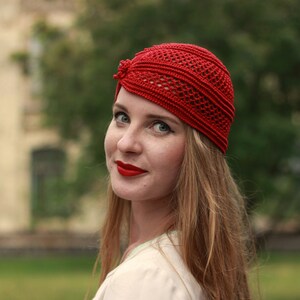 Stylish netted scull beanie on a woman head, spiral design pattern