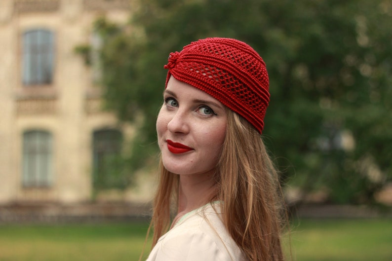 Stylish netted scull beanie on a woman head, spiral design pattern