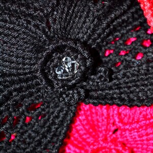 Close-up photo of a bead in crochet texture