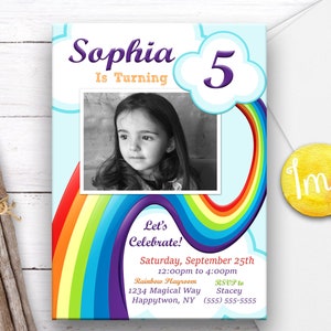 May include: A birthday invitation with a photo of a young girl, a rainbow design, and the text "Sophia Is Turning 5." The invitation includes event details and a yellow sticker with the initials "lmc."