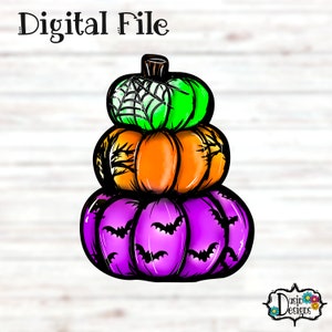 May include: A stack of three pumpkins with Halloween-themed designs. The top pumpkin is green with a spiderweb, the middle pumpkin is orange with a tree branch design, and the bottom pumpkin is purple with a bat pattern.