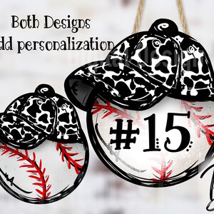May include: Two baseball-themed ornaments with a cow print baseball cap on top. One ornament has the number 15 on it.
