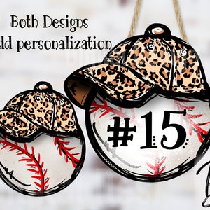 May include: Two baseball ornaments with a leopard print baseball cap on top. One ornament has the number 15 on it.
