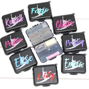 May include: Nine black plastic boxes with personalized names and a dancer silhouette. The names are: Kendall, Fage, Claire, Peyton, Elise, Lily, Prestey, Emma.
