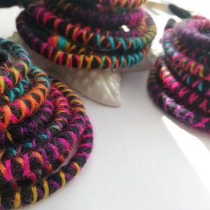 Woolly Ties - It's a safe way to tie up your dreadlocks. Easy to bend and secure your dreads, available to wear in many different styles. Made from wool, thread and wire inside.