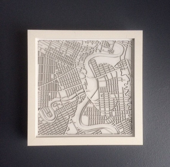 City of winnipeg map art. These maps are laser cut from white mateboard and come framed. Made in Winnipeg Manitoba. 9"x9"