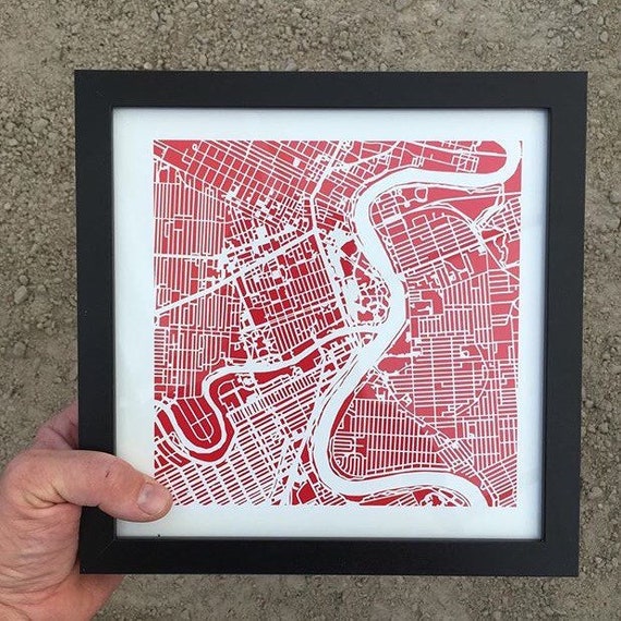 Winnipeg maps print, 10"x 10" comes framed. Red in colour