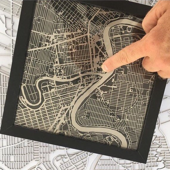 City of winnipeg map art. These maps are laser cut from stainless steel and come framed. Made in Winnipeg Manitoba. 9"x9"