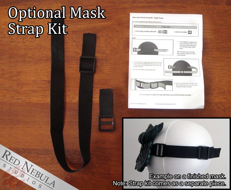 May include: A black adjustable mask strap kit with two straps and a buckle. The kit is shown on a wooden surface with instructions for attaching the straps to a mask. The text "Optional Mask Strap Kit" is at the top of the image. The text "RED NEBULA STUDIOS" is at the bottom of the image. The text "Example on a finished mask. Note: Strap kit comes as a separate piece." is at the bottom of the image.
