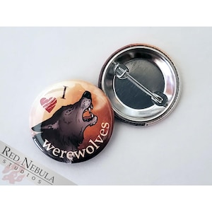 May include: A round button with a red heart and the text "I love werewolves" in white. The button features a howling werewolf against a sunset background.