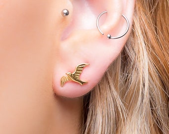 Pendientes de oro con forma de pájaro: Joyería de plata de ley con forma de pájaro en vuelo.