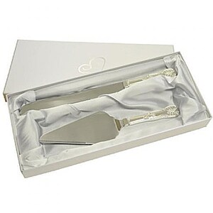 May include: A white box with a silver cake knife and server set inside. The set is wrapped in white tissue paper.