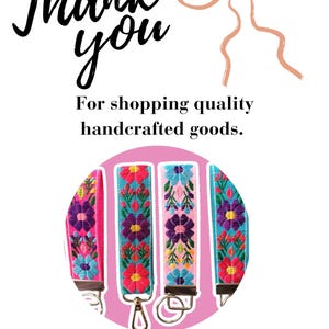 May include: A thank you card featuring a peach-colored ribbon illustration and the text Thank you For shopping quality handcrafted goods. Below, a circular graphic displays four fabric key fobs with colorful floral embroidery and metal clasps.