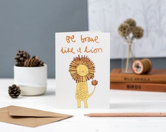 Be brave like a lion greetings card with bright lion illustration
